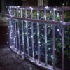 Garden fence illumination showing red green blue and yellow LEDs
